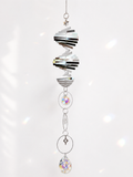 Attrape-soleil spirale argentée, soleil et étoile du Nord – Suncatcher fait main